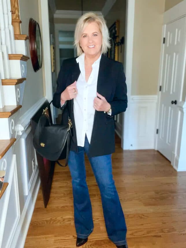 Flare jeans, a white button up shirt and black blazer