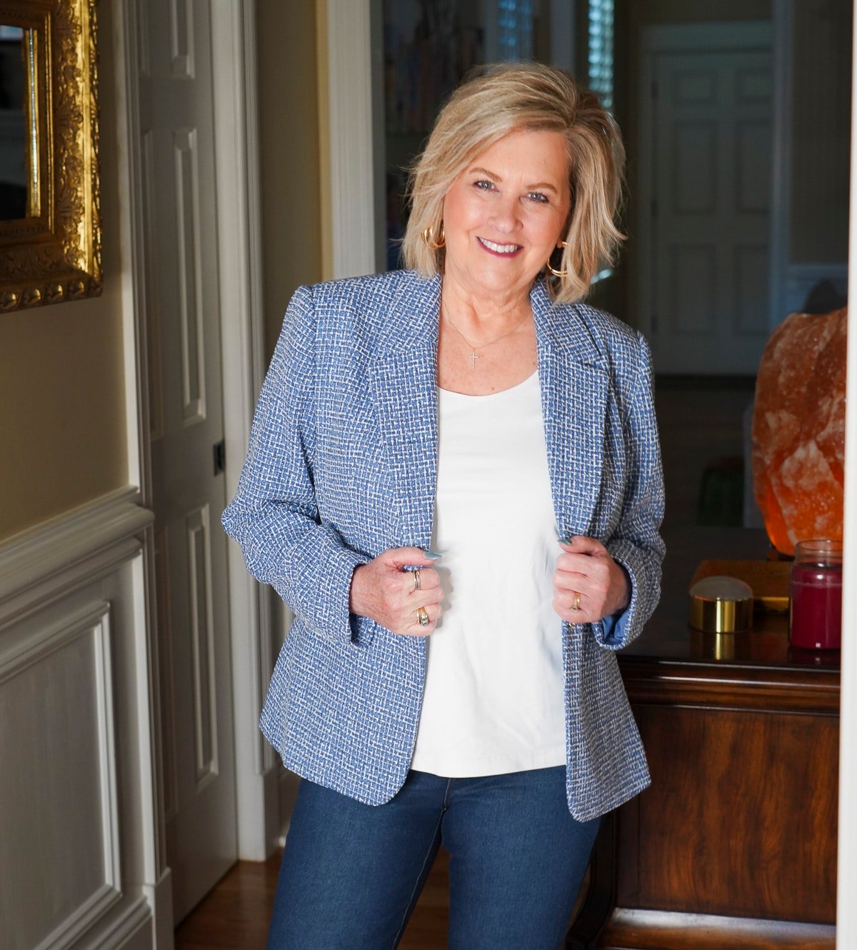 Tania Stephens, an over 50 fashion blogger, is styling a blue tweed jacket with a white tee 