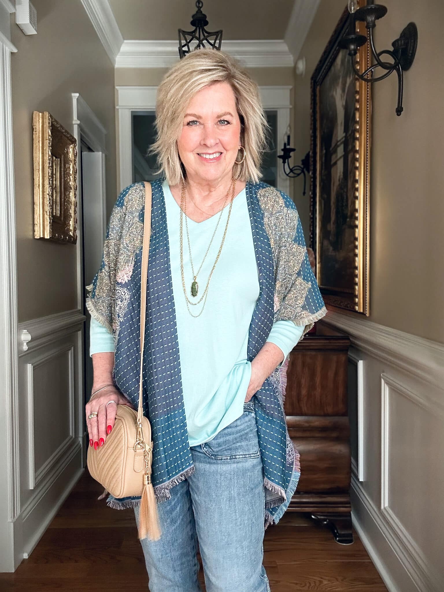 Tania Stephens is wearing J.Jill new arrivals for Spring = a mint tunic top and a kimono/ruana