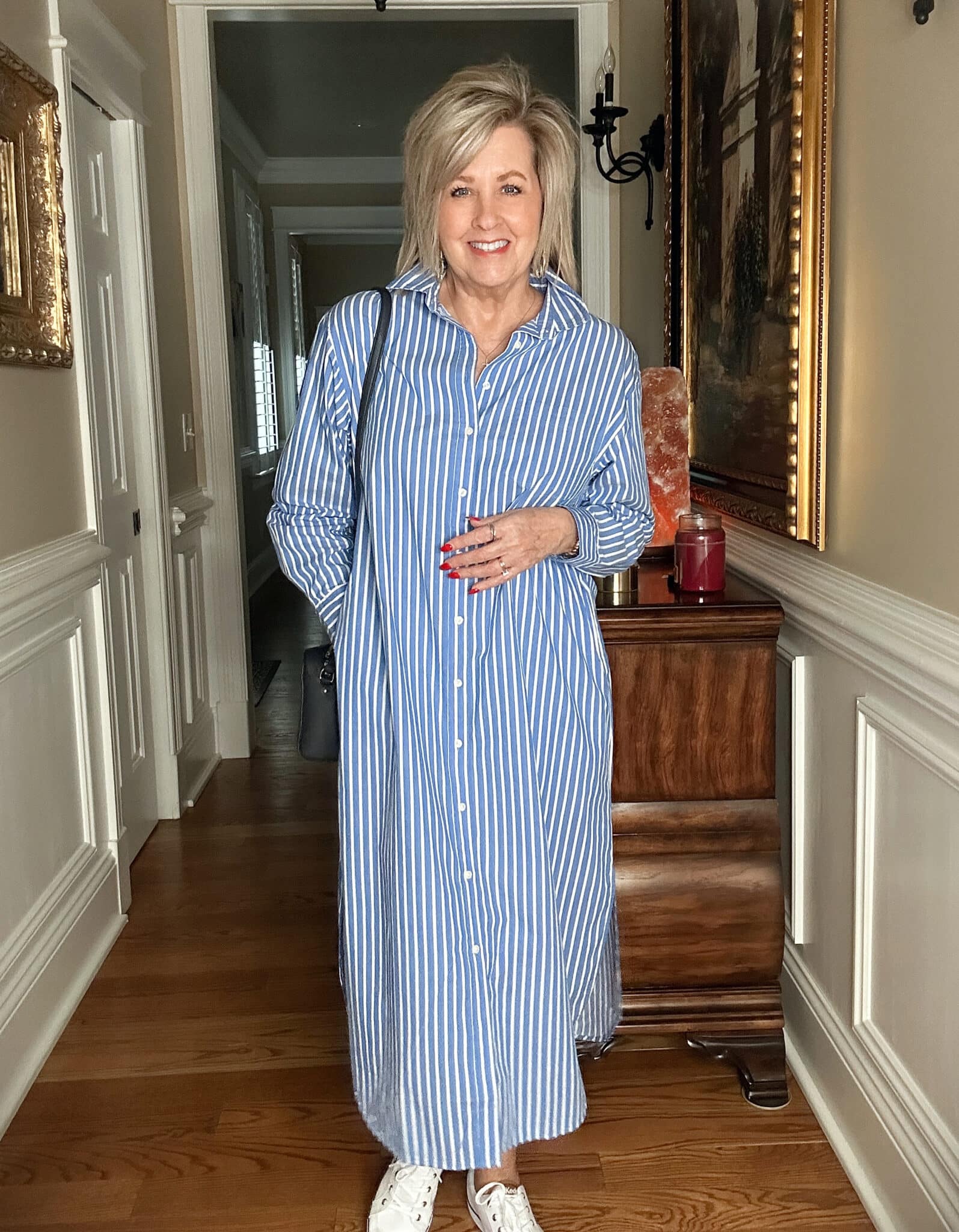 Over 50 Fashion Blogger, Tania Stephens is styling Old Navy clothing - a blue & white striped shirtdress and Keds sneakers