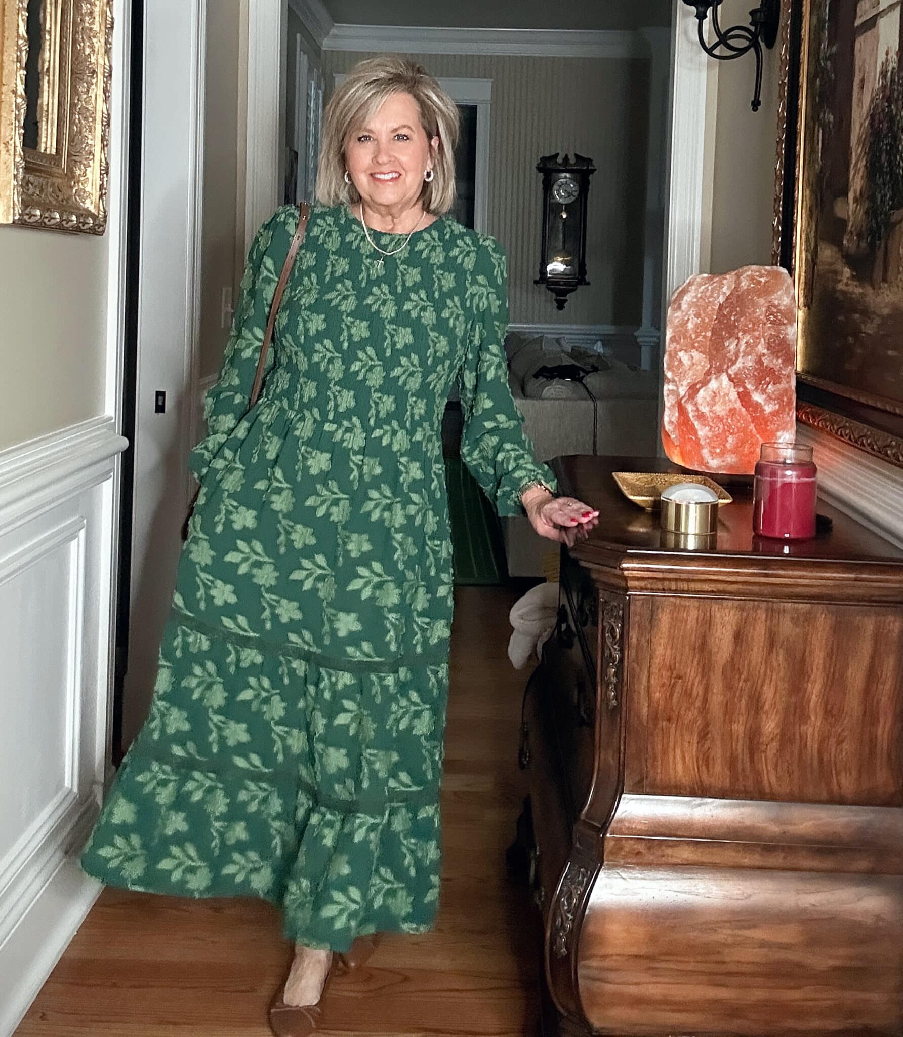 Tania Stephens is wearing a trending color Emerald Green maxi dress