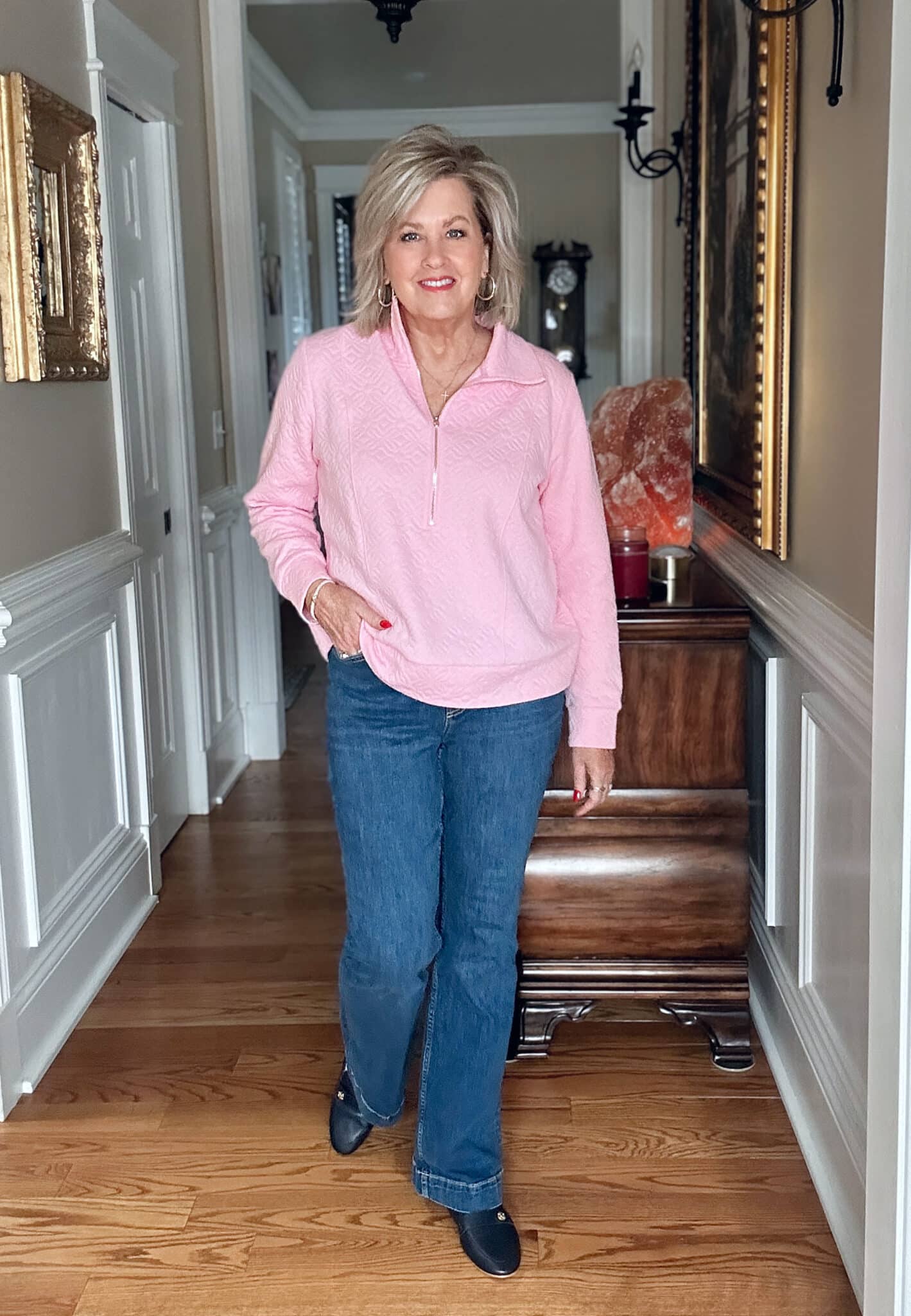 Tania Stephens is wearing a Lilly Pulitzer pullover and jeans for a What I Wore series