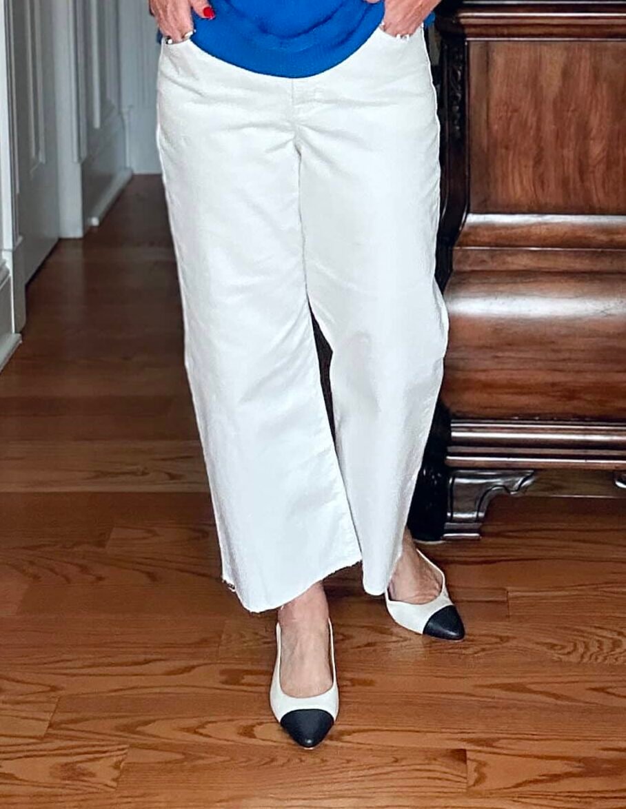 Tania Stephens is wearing wide leg white pants for a What I Wore series