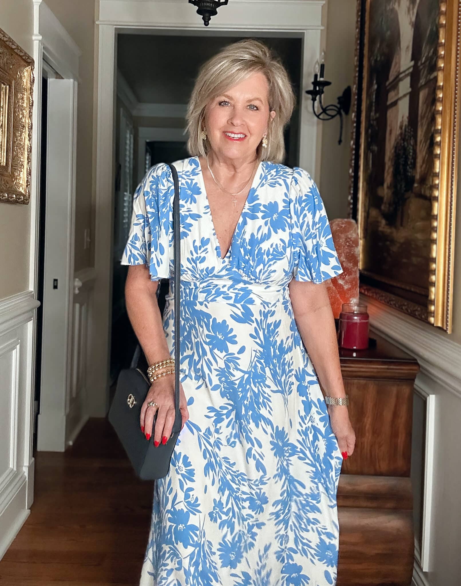 Tania Stephens wearing affordable and budget friendly clothing - a blue & white floral dress from Target