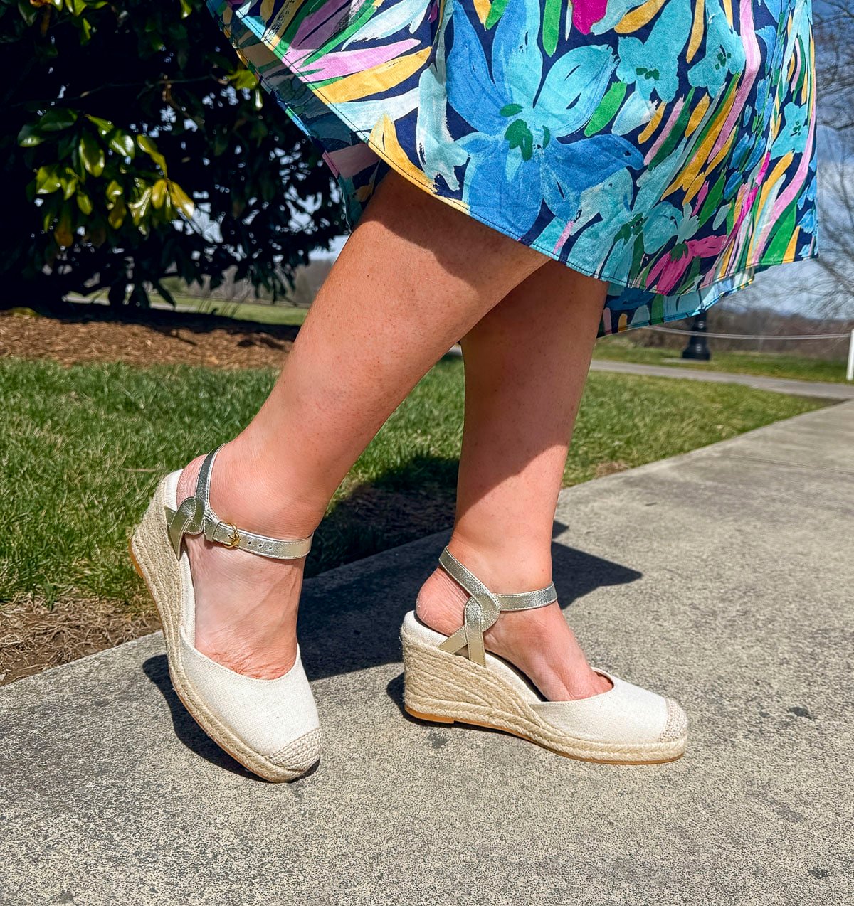 Tania Stephens wearing 2025 Spring styles of a colorful dress and neutral espadrilles from Nordstrom Rack