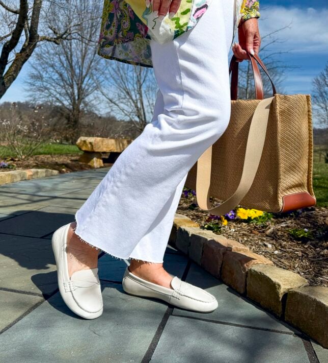 Tania Stephens wearing 2025 Spring styles of a colorful jacket and white jeans from Nordstrom Rack