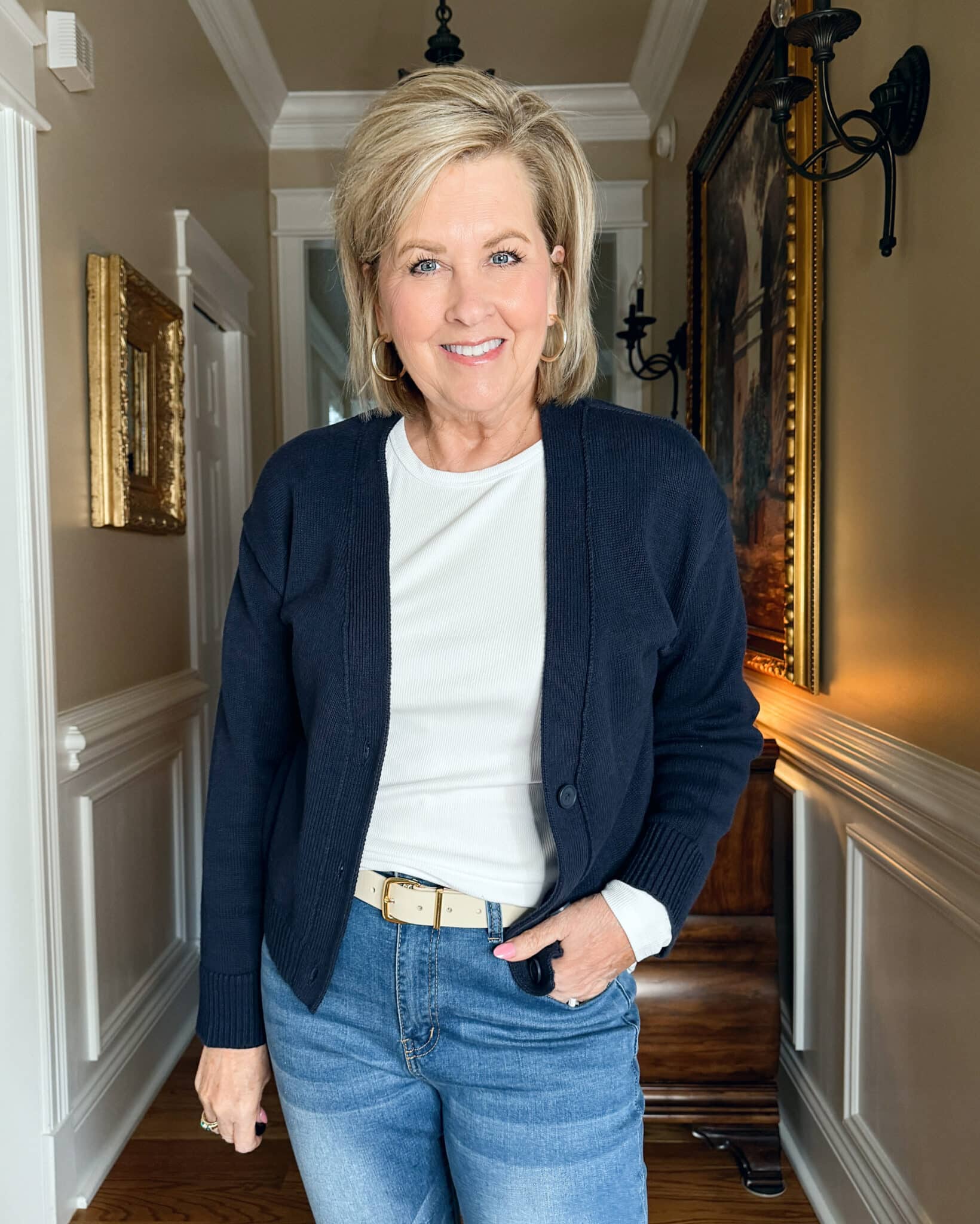 Tania Stephens is wearing a tee and a navy cardigan from Amazon