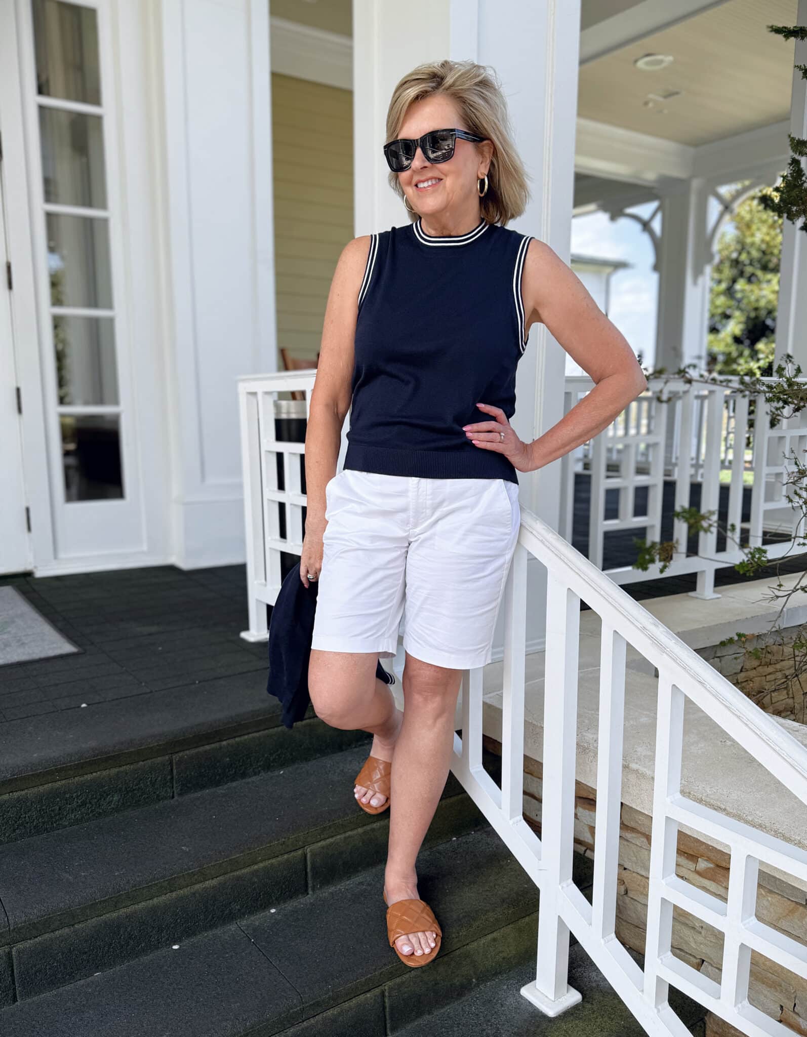 Tania Stephens wearing white 9" Bermuda shorts