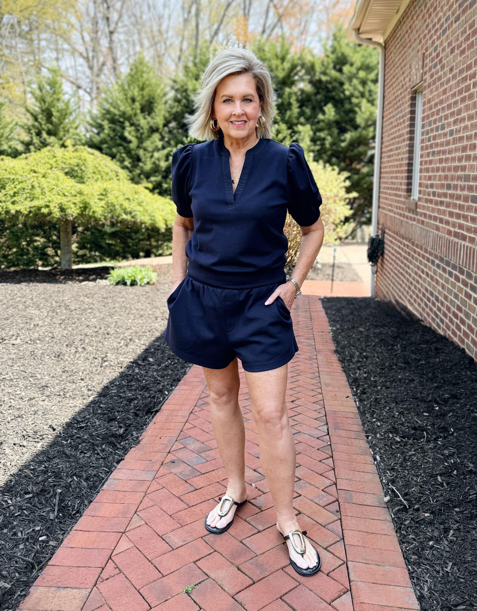 Tania Stephens wearing a navy puff sleeve matching shorts from Walmart