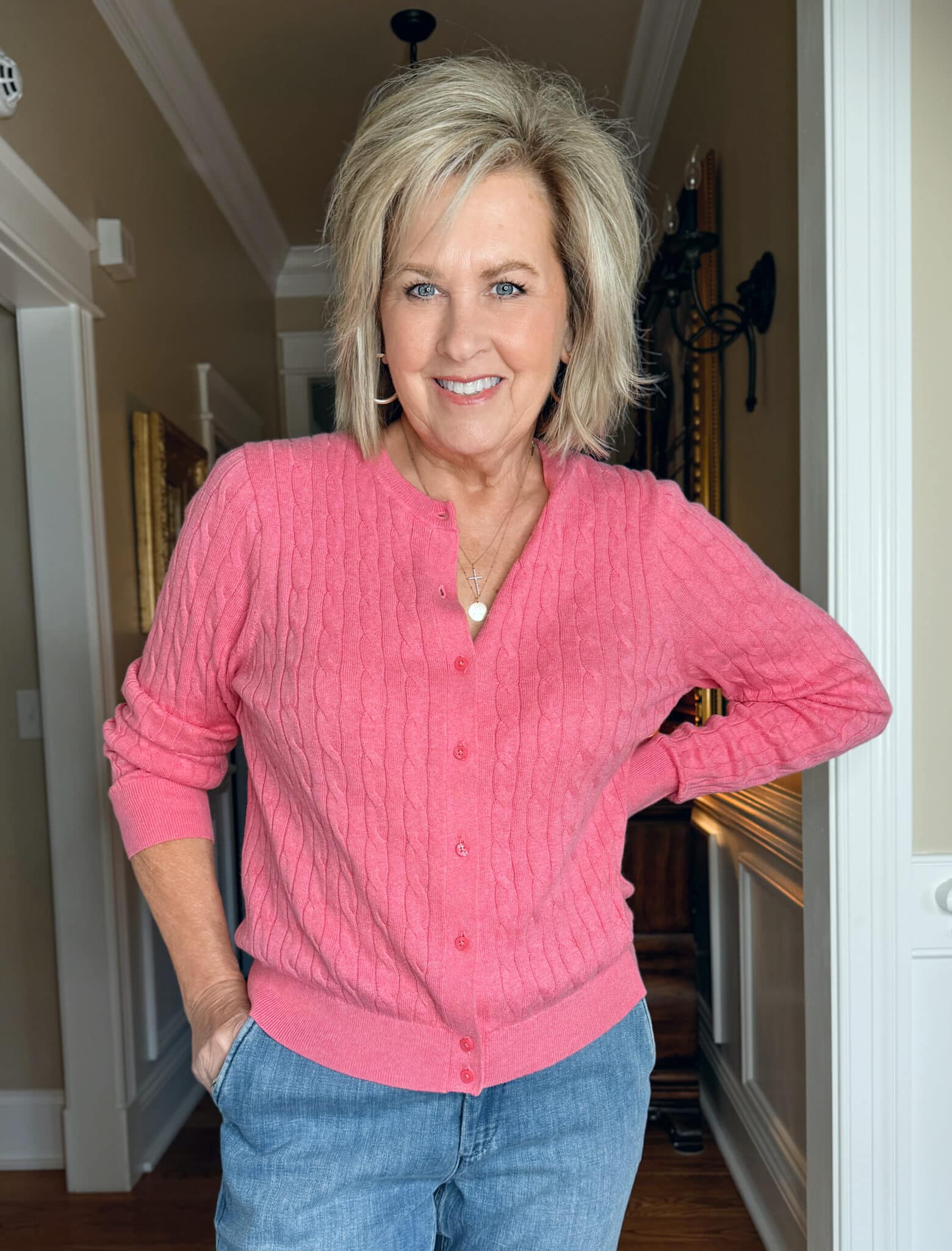 Tania Stephens is wearing a medium pink sweater cardigan  from J.Crew Factory