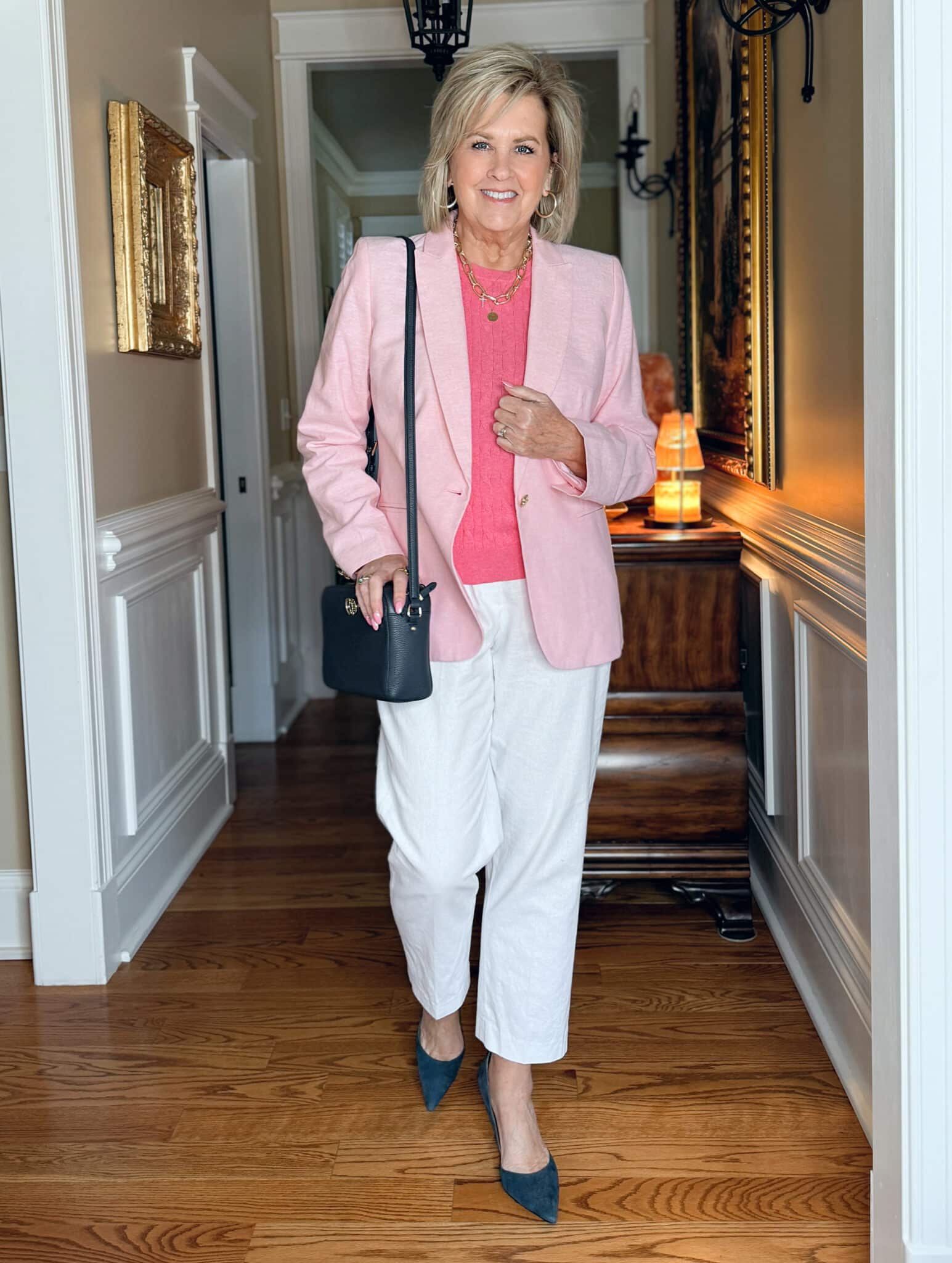Tania Stephens is wearing a Pink blazer with a medium pink shell and white crops from J.Crew Factory