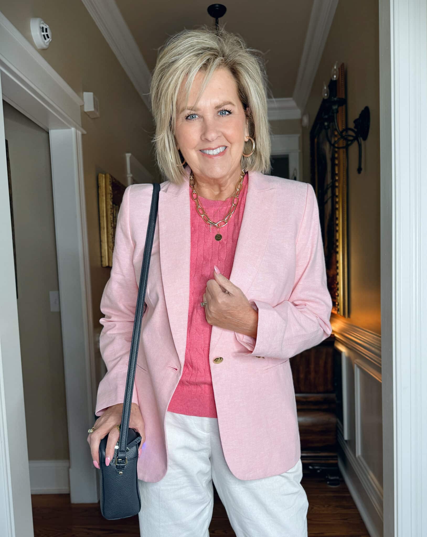 Tania Stephens is wearing a Pink blazer with a medium pink shell J.Crew Factory