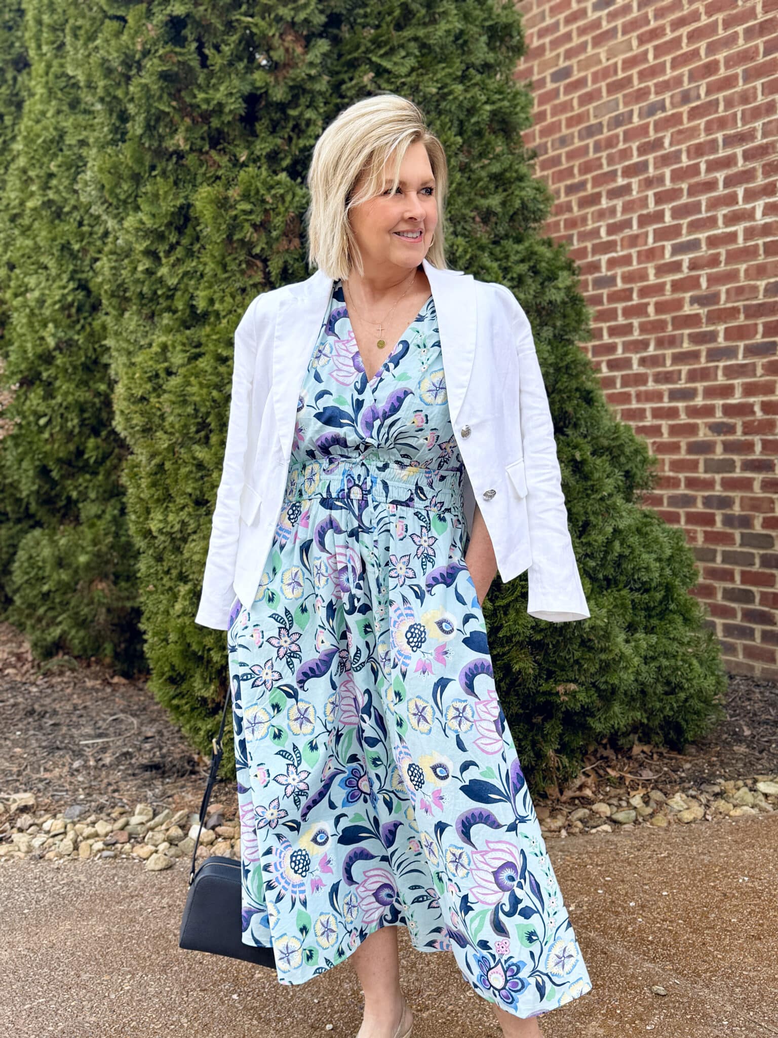 Tania Stephens wearing a dress and white blazer from Talbots