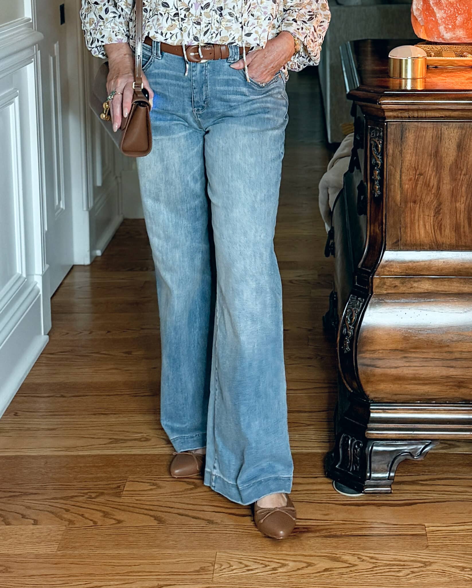 Tania Stephens wearing light wash jeans from Nordstrom Rack