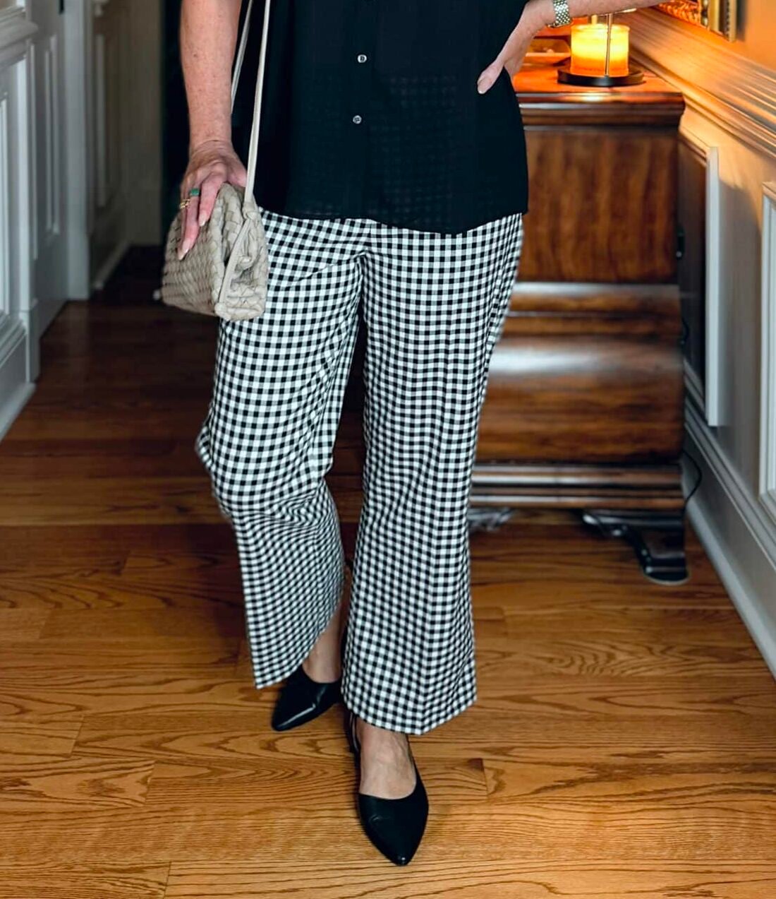 woman wearing Ann Taylor black gingham pants for spring