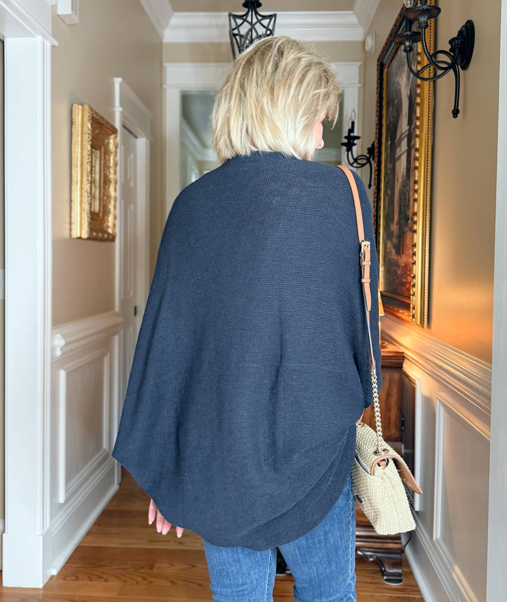 woman wearing a J.Jill a  navy cardigan