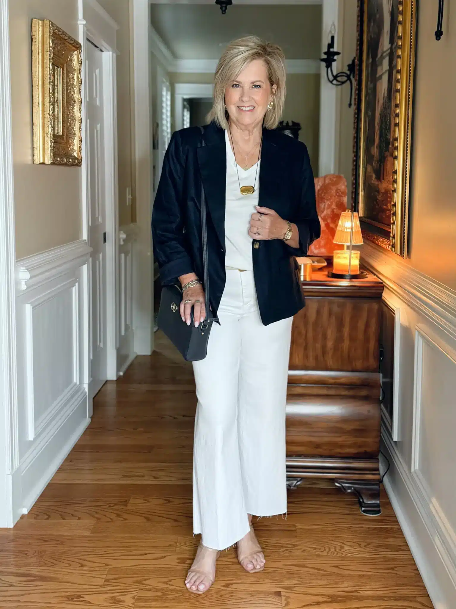Tania Stephens styling a white V-neck tee under a linen blazer with wide-leg jeans