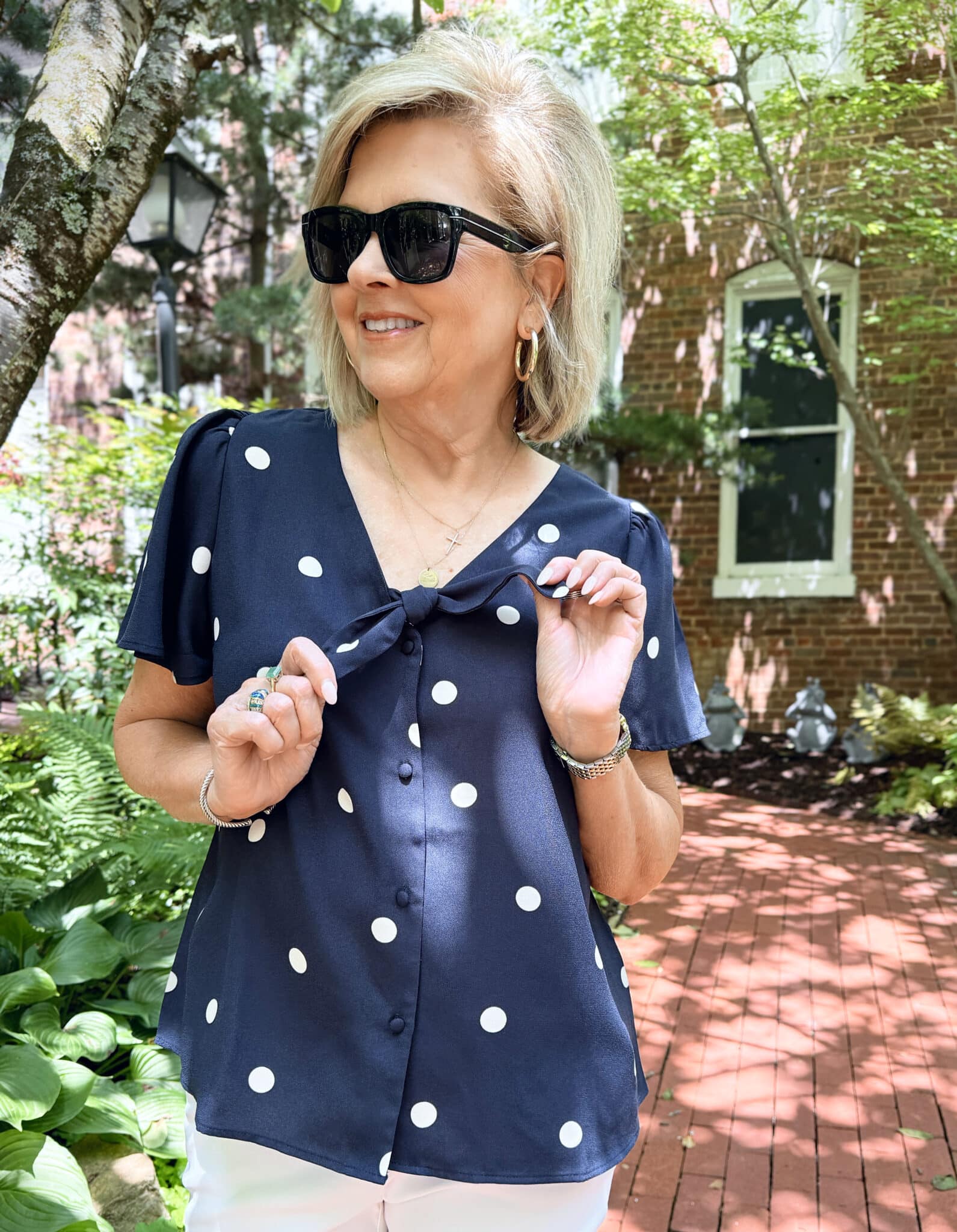woman wearing a polka dot shirt from Kohl's