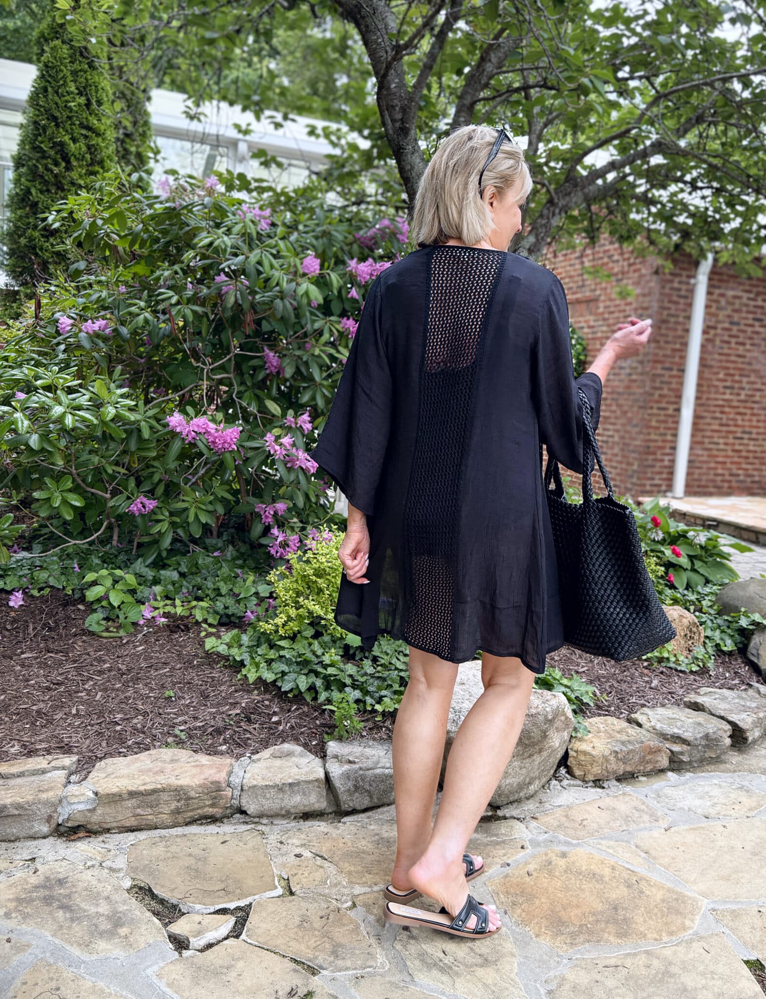 woman wearing a black cover up