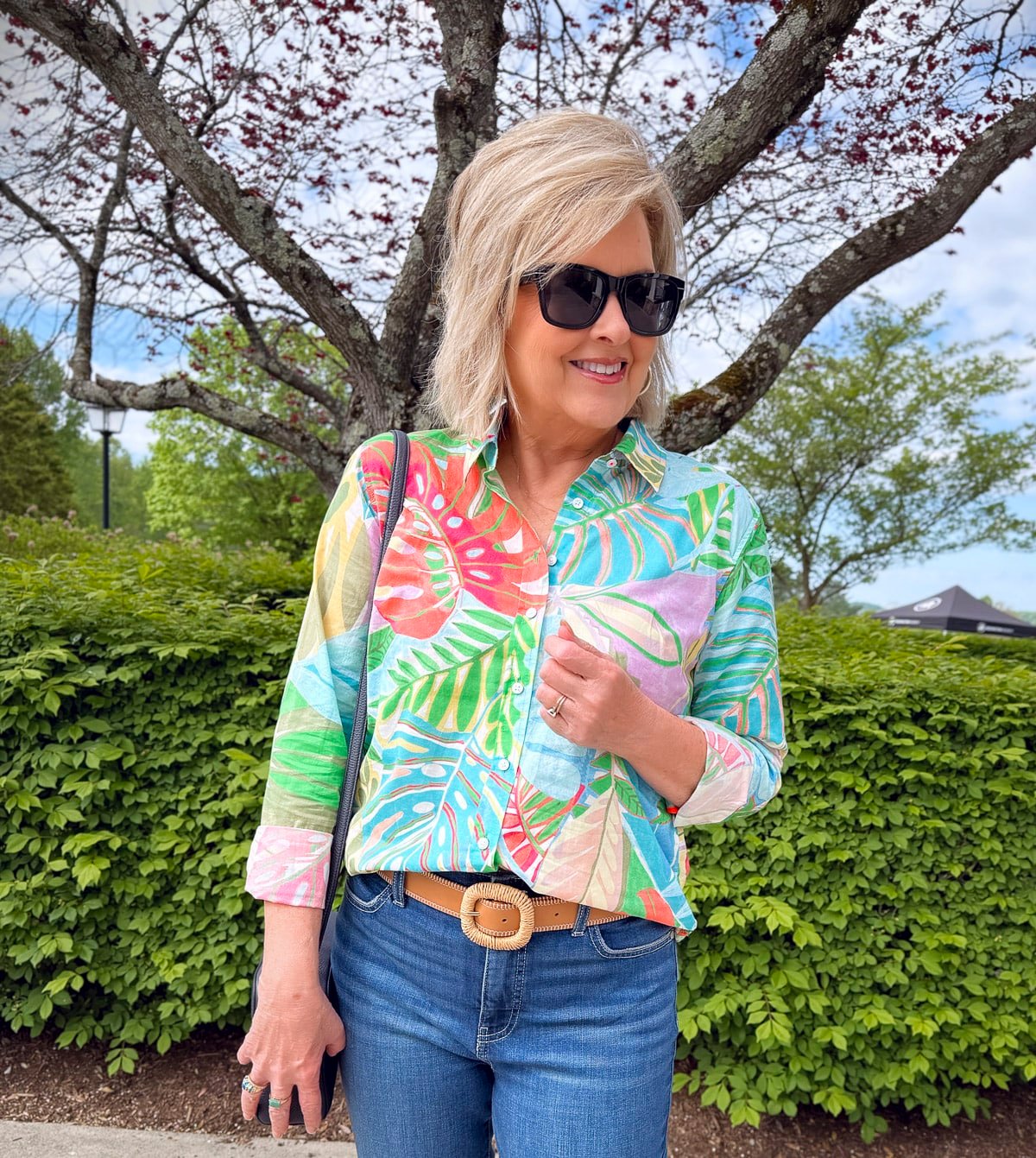 Tania Stephens wearing a tucked tropical print shirt from Talbots