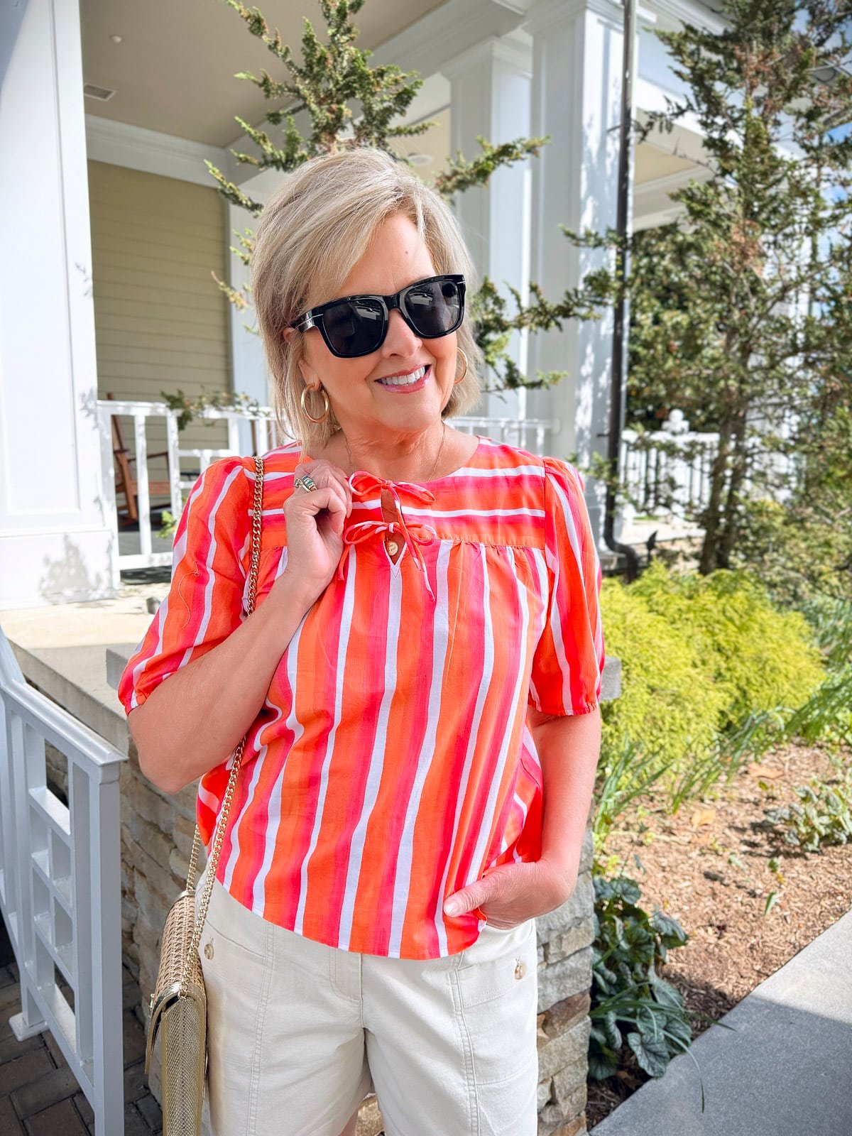 Tania Stephens wearing a coral stripe top Talbots