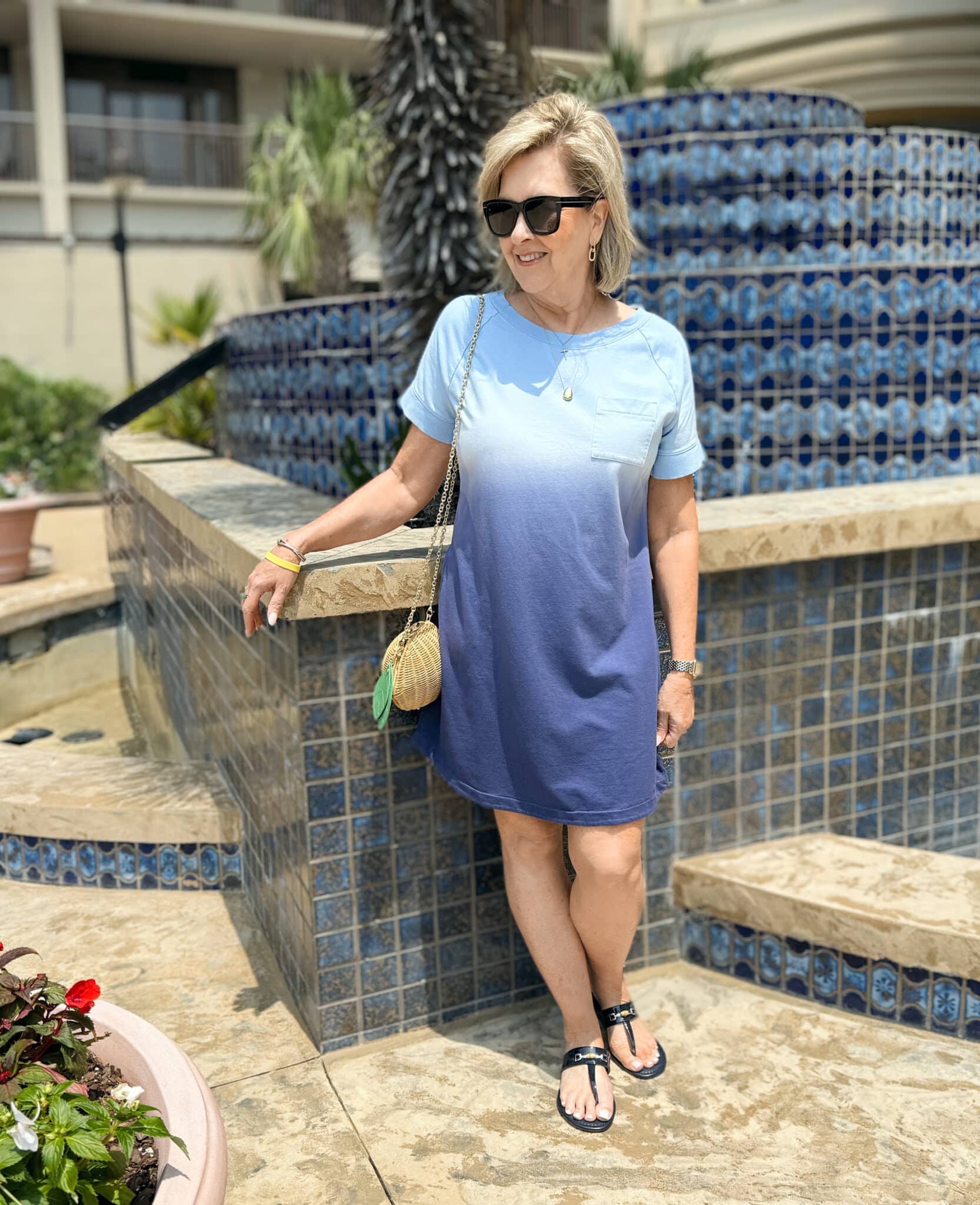 woman wearing a blue tie-dye t-shirt dress for summer