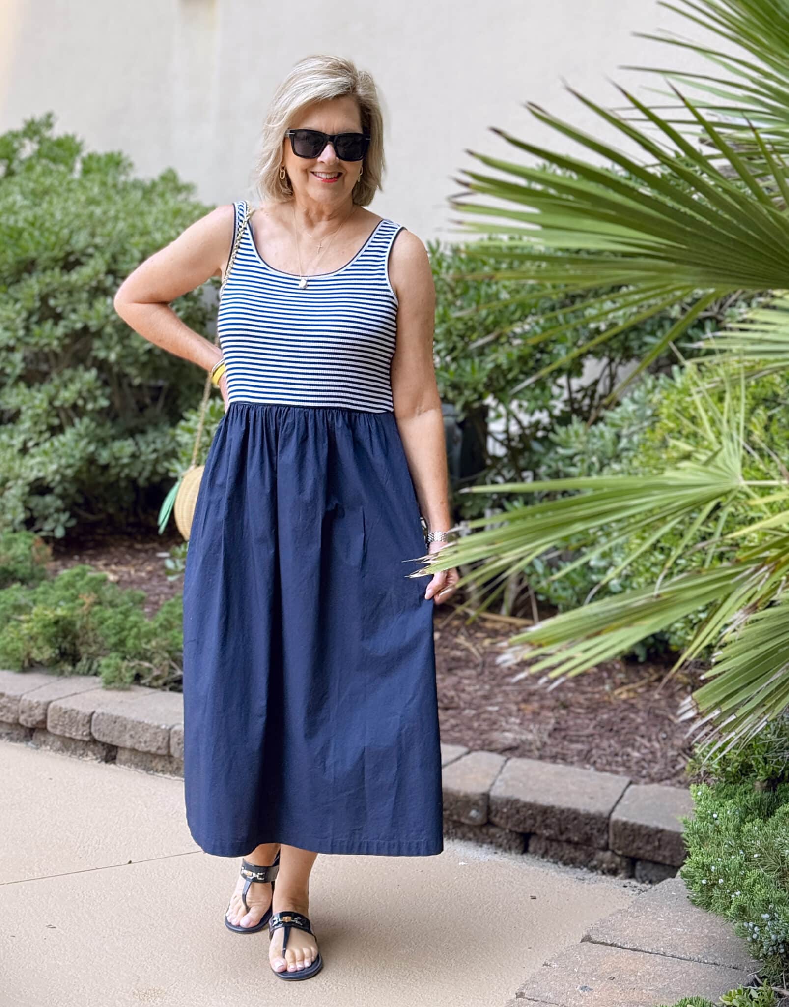 Tania Stephens at the beach wearing a navy & white striped midi dress from Talbots