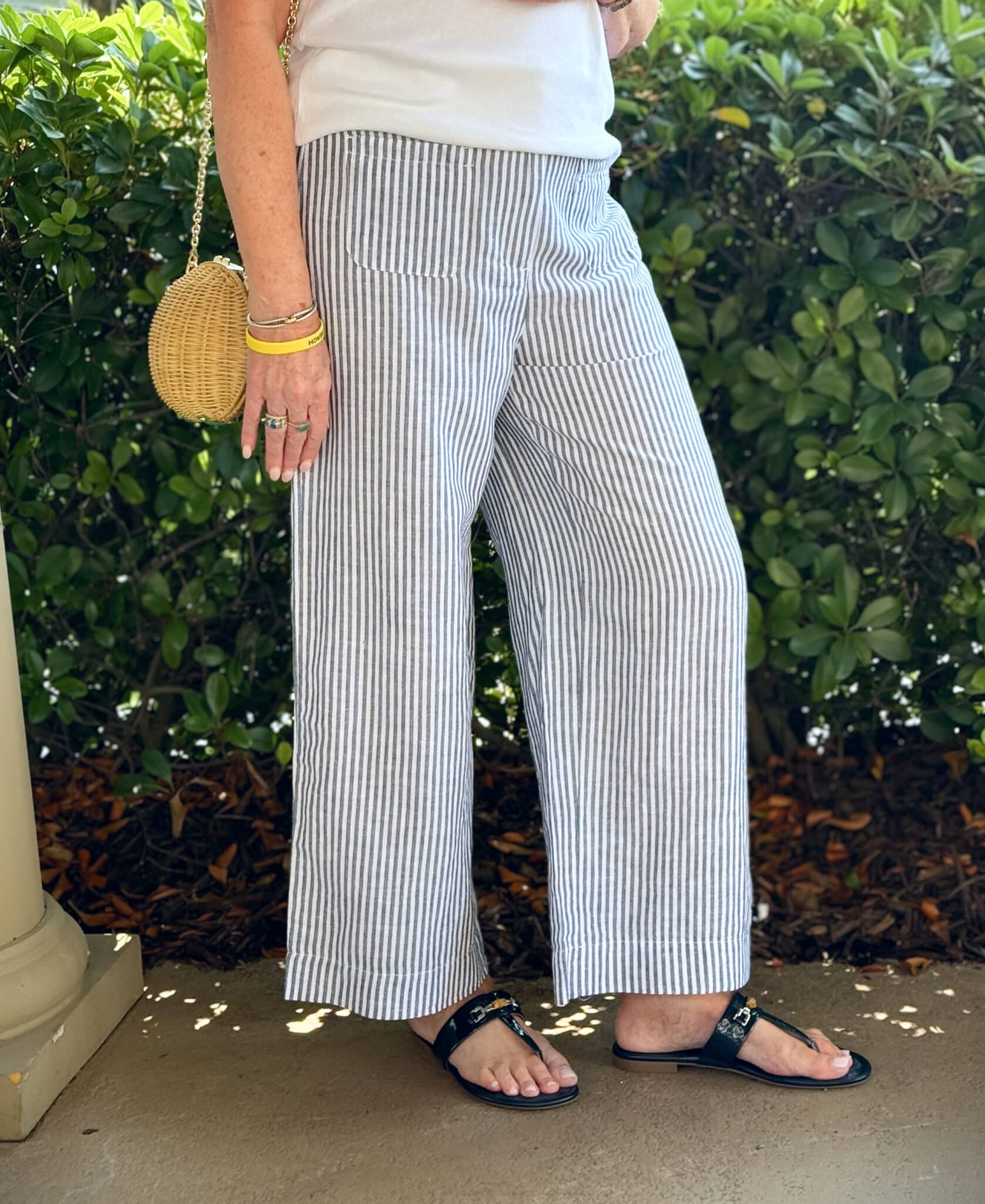 Tania Stephens at the beach wearing striped linen pants from Talbots