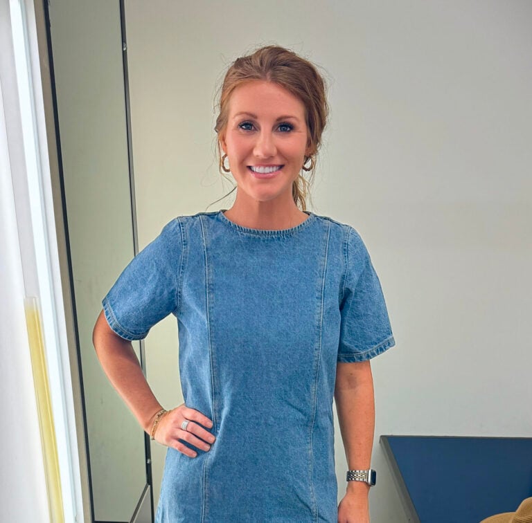 Stephanie wearing a denim dress from Old Navy