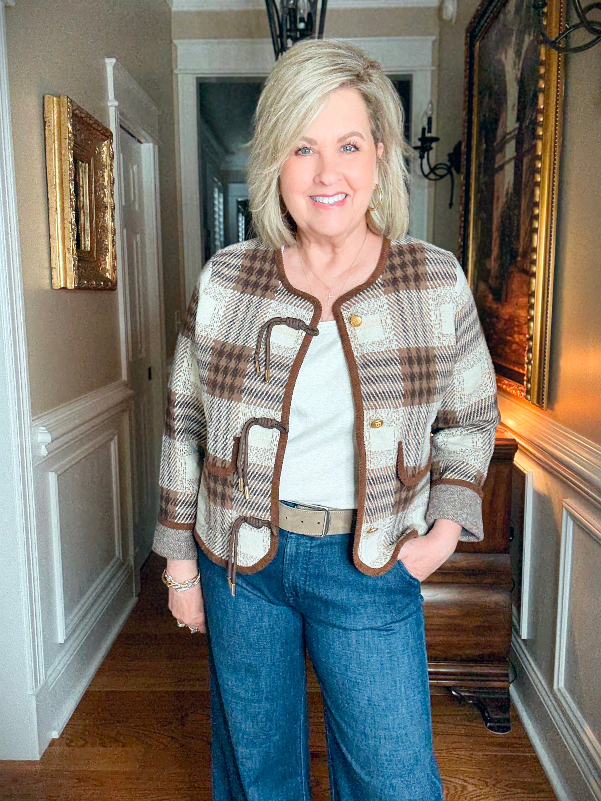 Tania is wearing an plaid jacket 