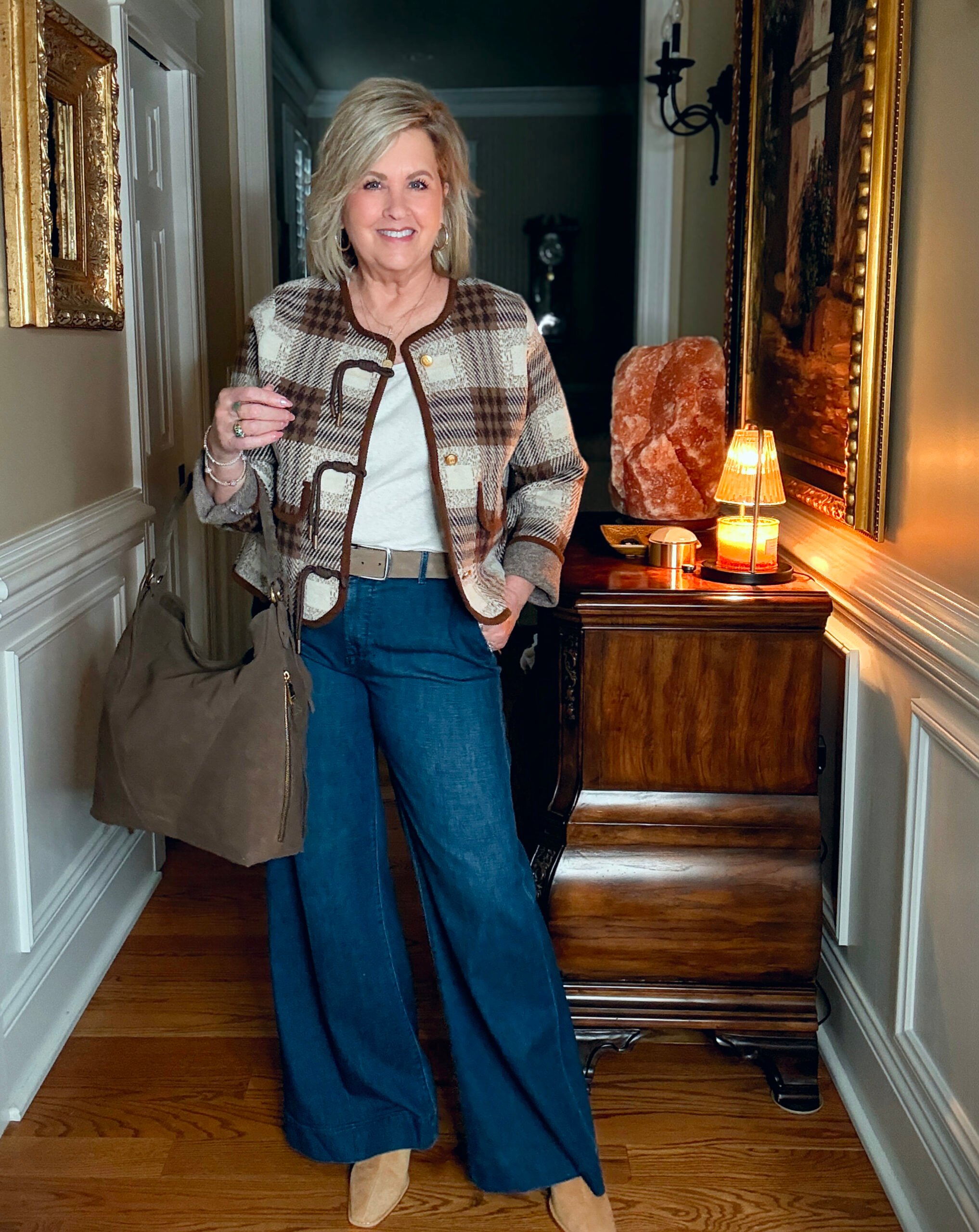 Tania is wearing an plaid jacket with wide leg jeans
