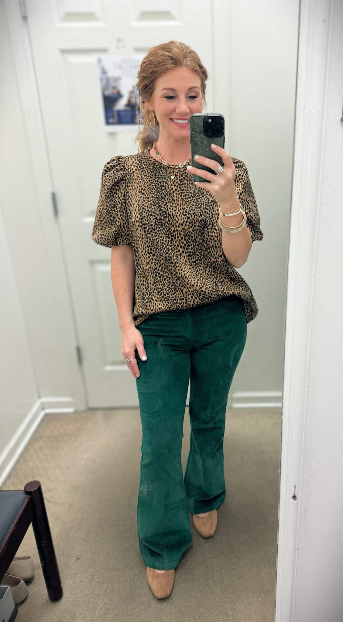 Stephanie wearing a Belk-cheetah-puff-sleeve-and-green-corduroy-pants