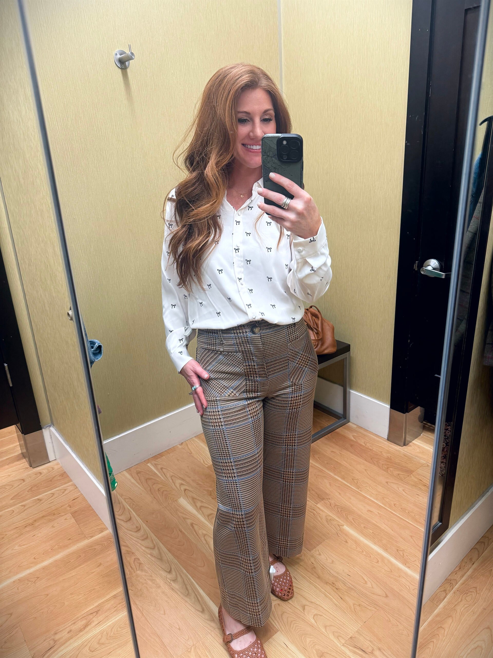 Stephanie wearing seventies-inspired pants from Kohl’s with a retro vibe and minimal stretch