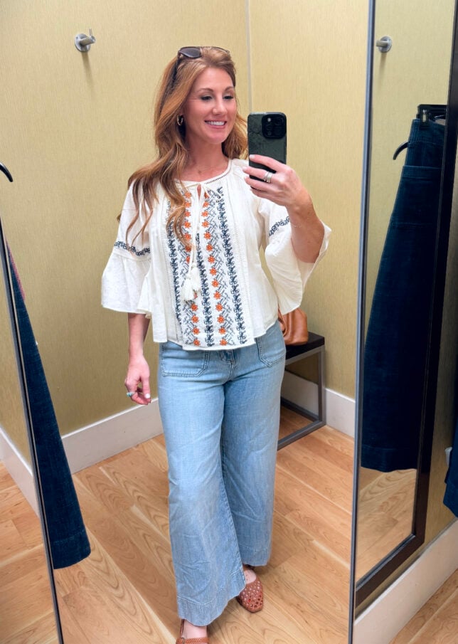 Stephanie wearing a fall top and light wash jeans from Kohl s