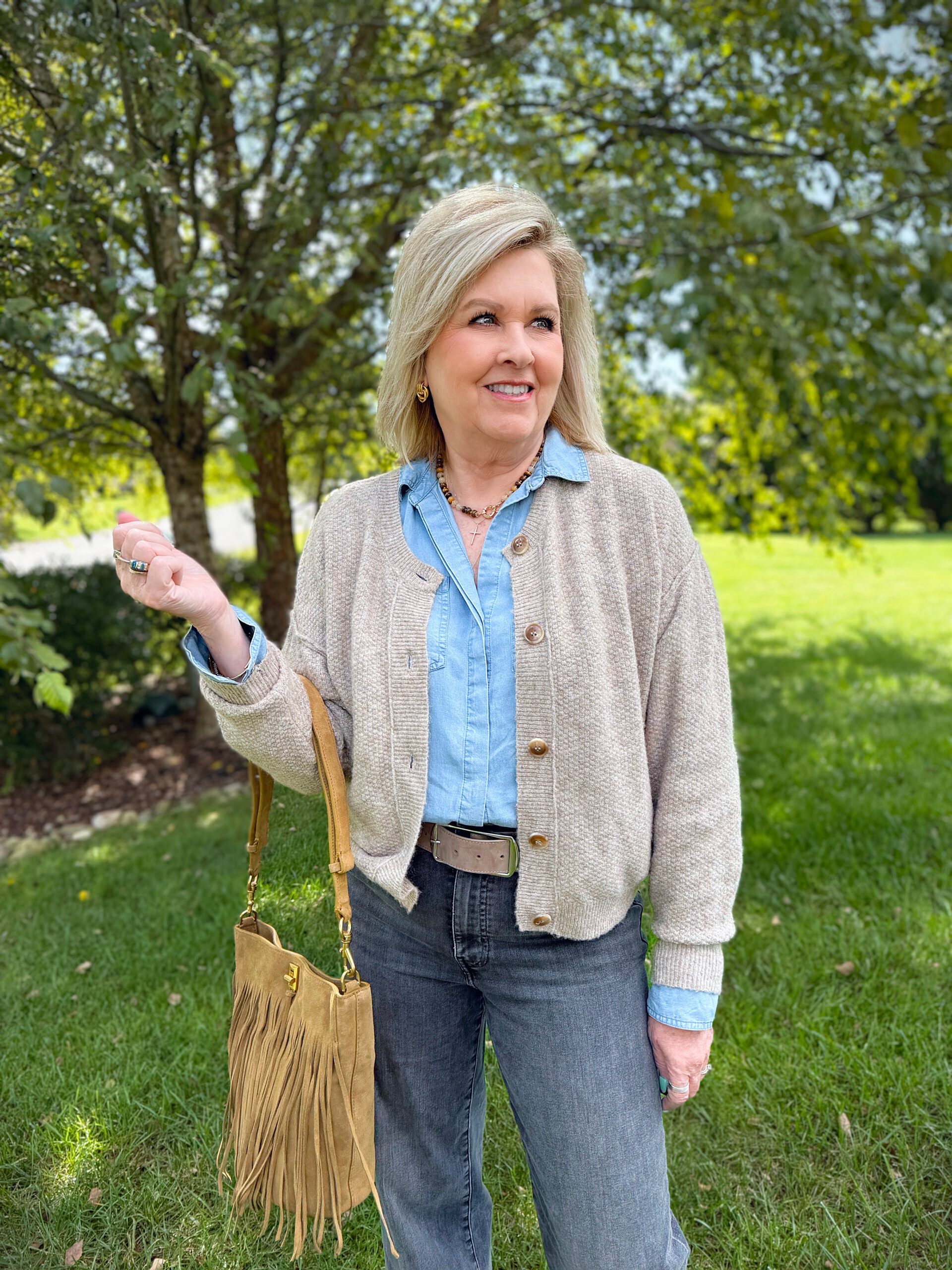 Tania wearing a chambray shirt and a brown cardigan from Nordstrom Rack