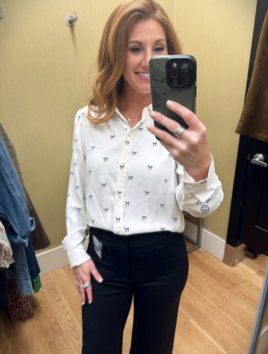 Stephanie wearing a blow shirt and black pants from Kohl's