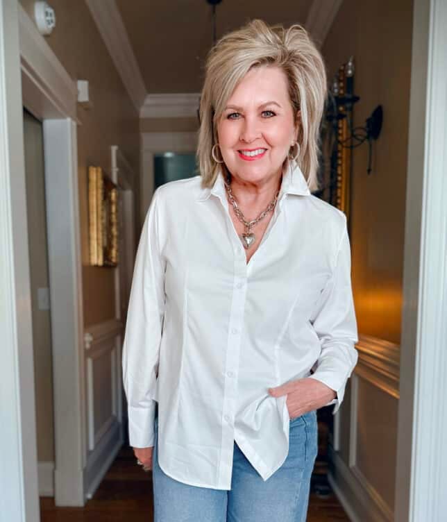 Tania is wearing an Amazon White Button Down Shirt with silver jewelry