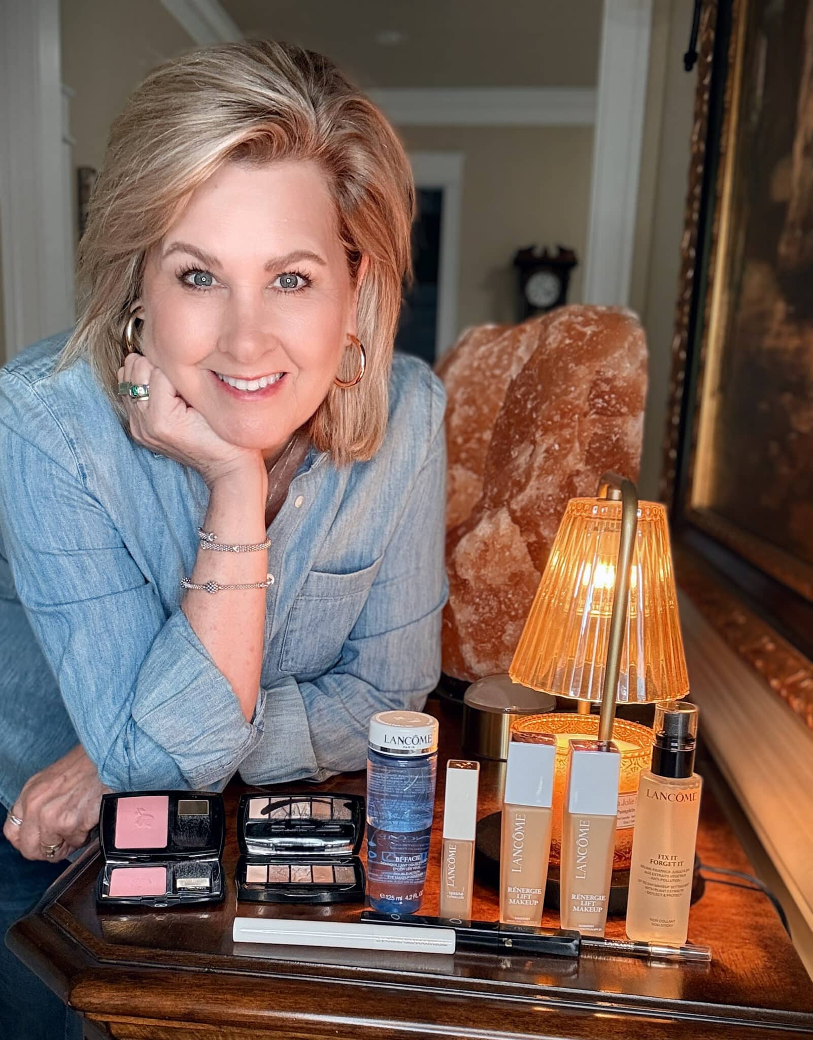 Full array of Lancôme makeup products from Nordstrom Beauty, including foundation, blush, and cleanser, displayed on a table.