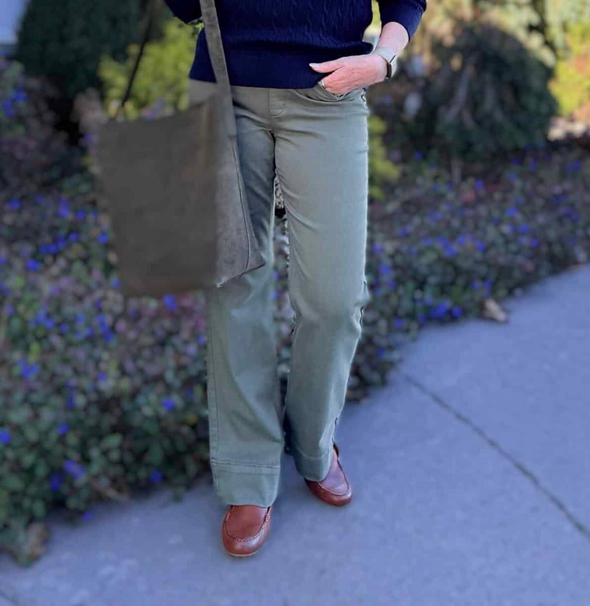 Tania wearing an olive pai of jeans from Amazon