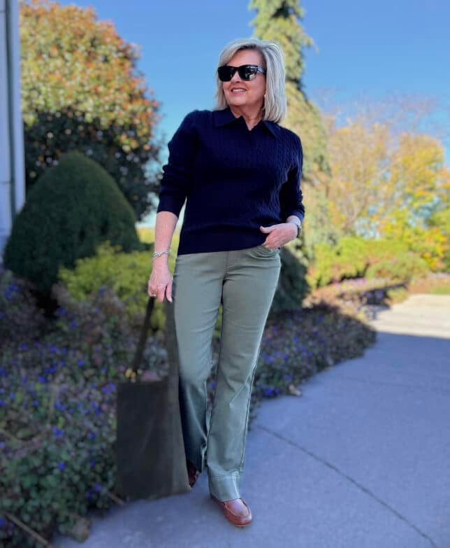 Tania wearing a navy sweater with olive jeans from Amazon