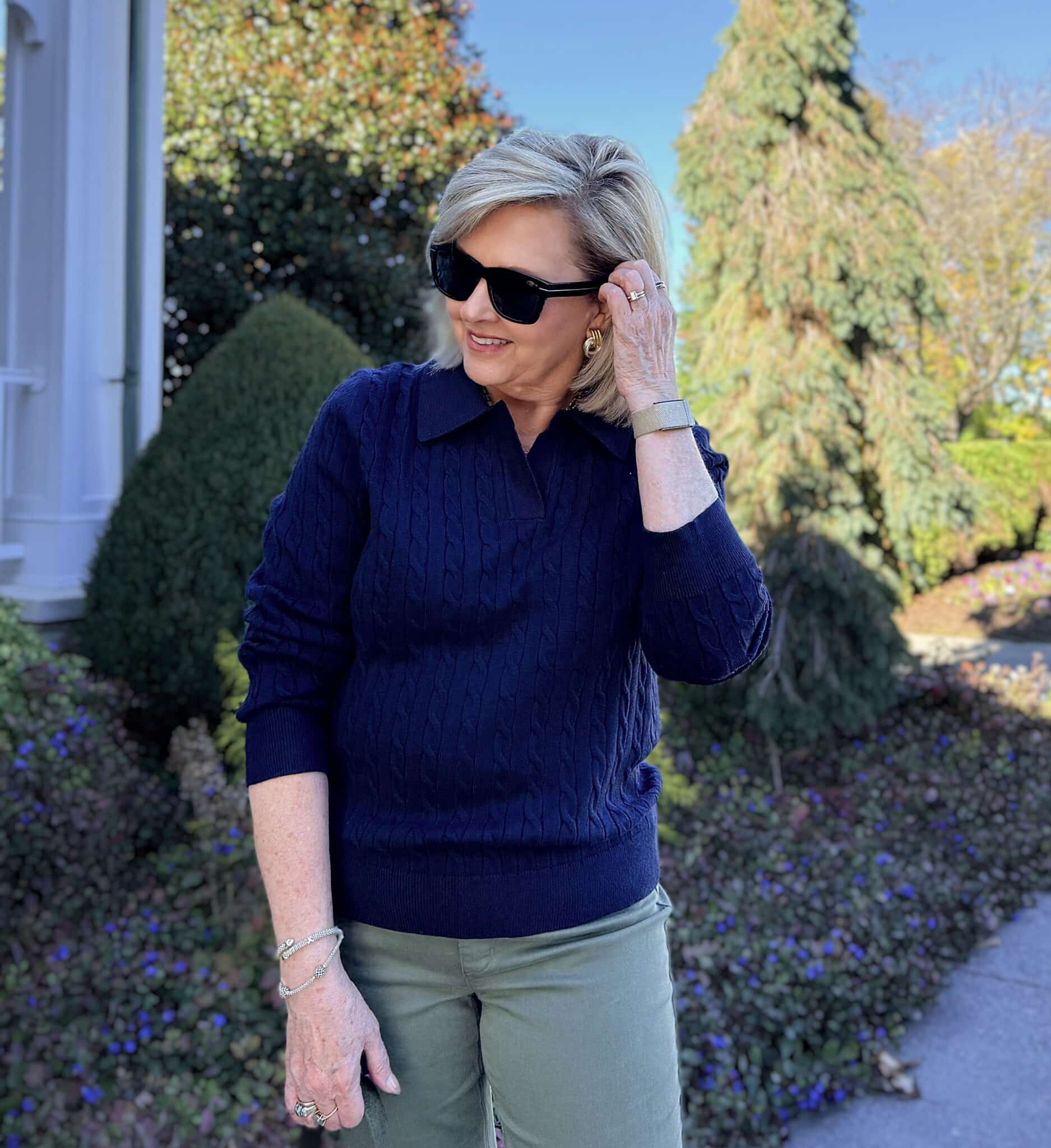 Tania wearing a navy sweater from Amazon