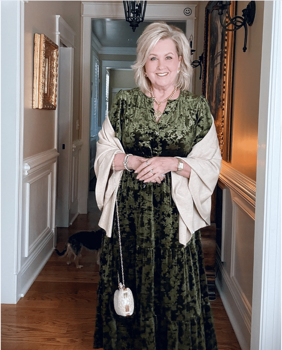 Tania wearing an Amazon green velvet dress with a wrap