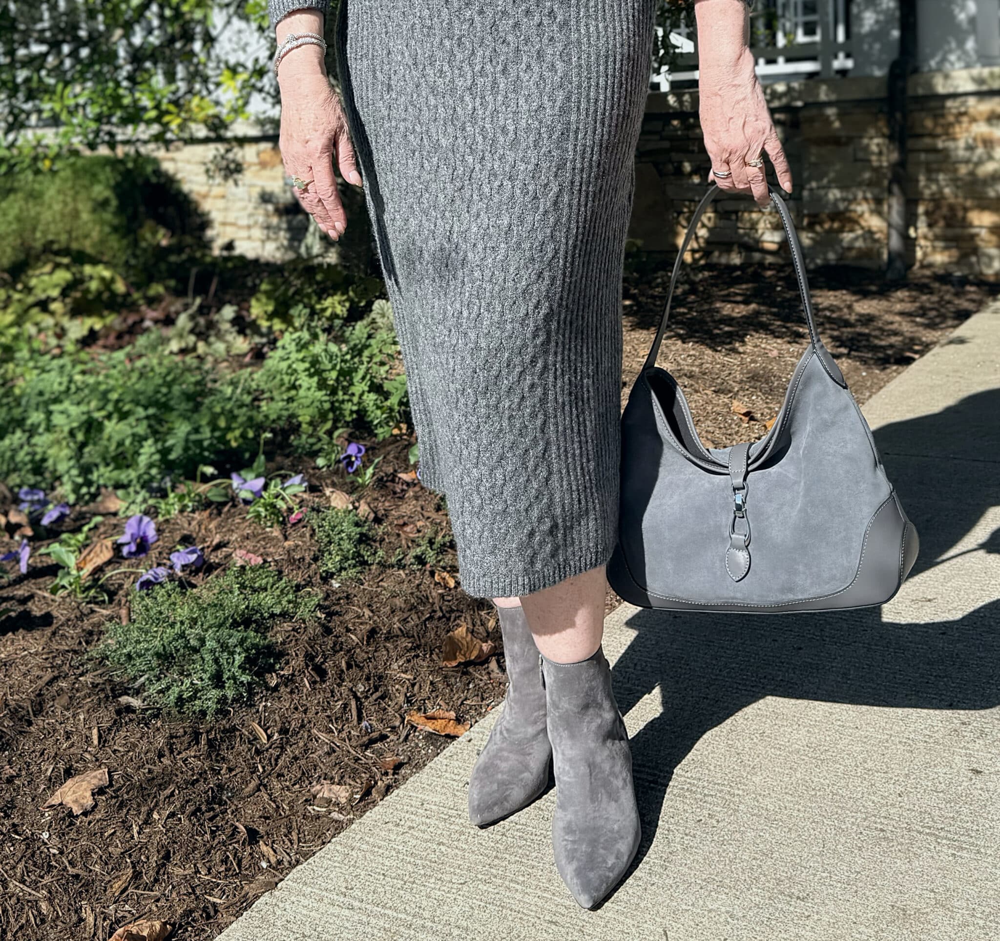 Talbots gray skirt with gray ankle boots and gray handbag