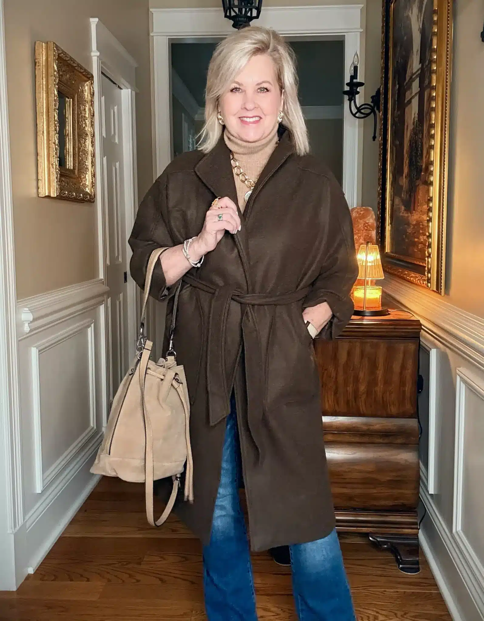 Oversized chocolate brown wrap coat styled with jeans, how to wear brown this fall