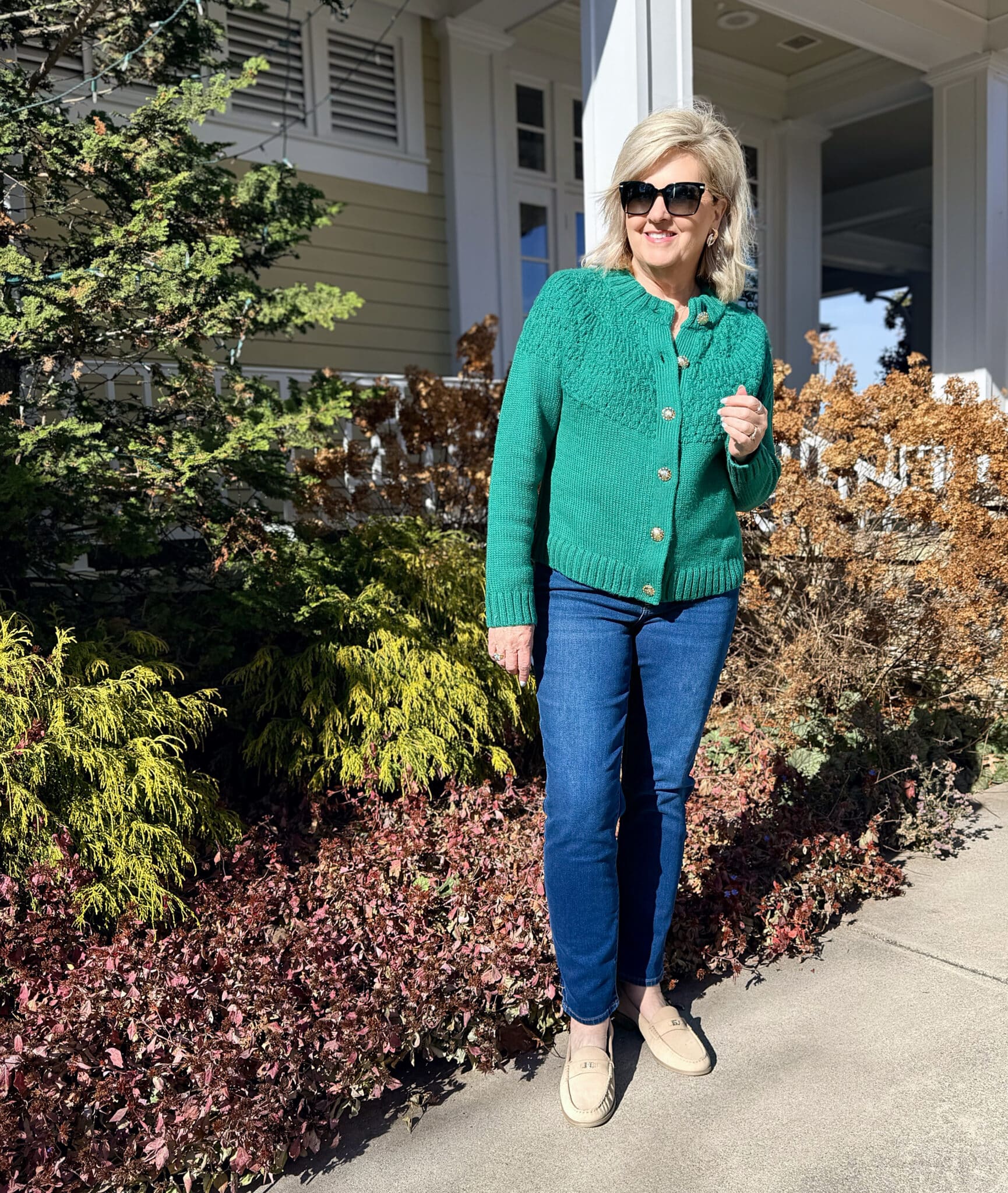 Tania in a green cardigan with slim jeans from Talbots