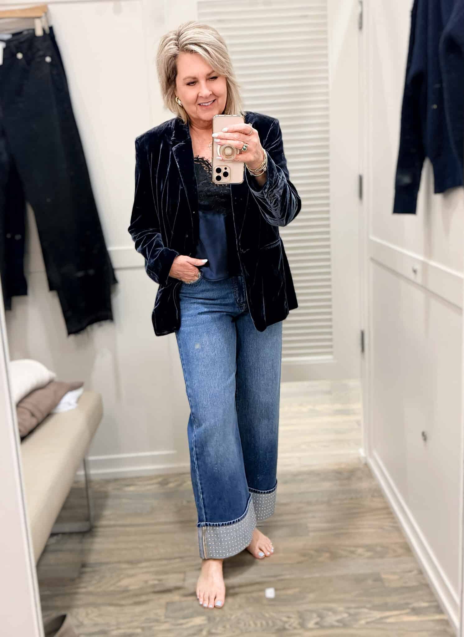 Tania doing a Loft try-on haul in a deep blue velvet blazer and jeans