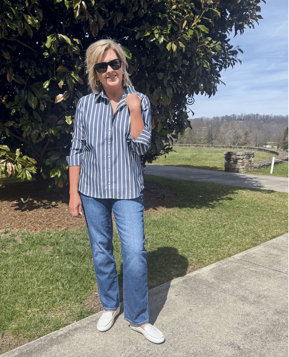 Tania Stephens is wearing a striped button up shirt with straight leg jeans from Lands' End at Nordstrom