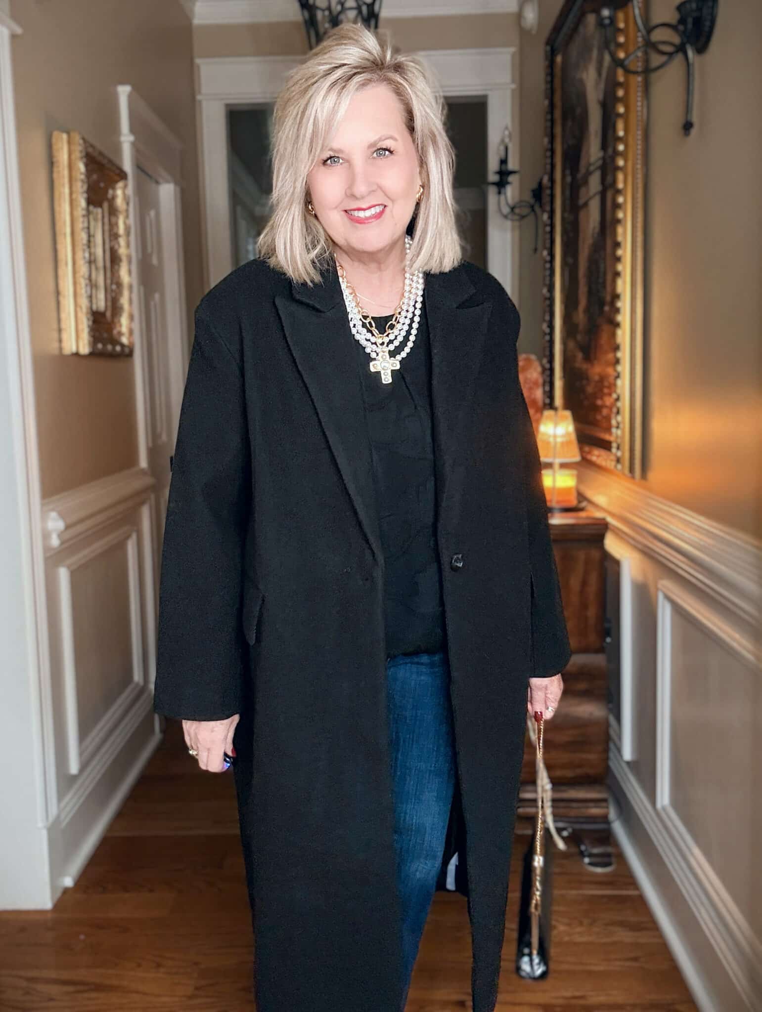 Tania wearing a  black dress coat from Walmart