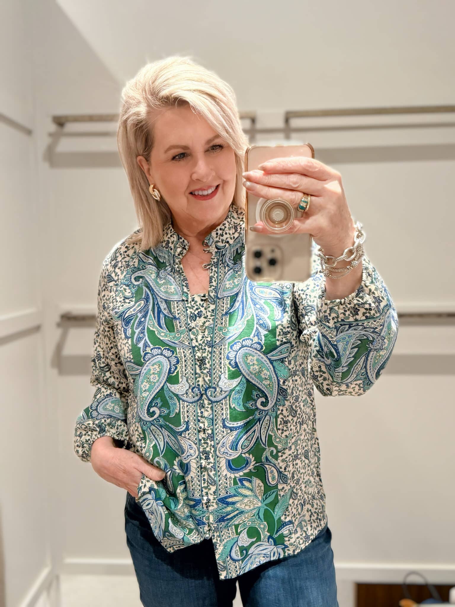 Tania wearing a brightly colored paisley top from J.Jill