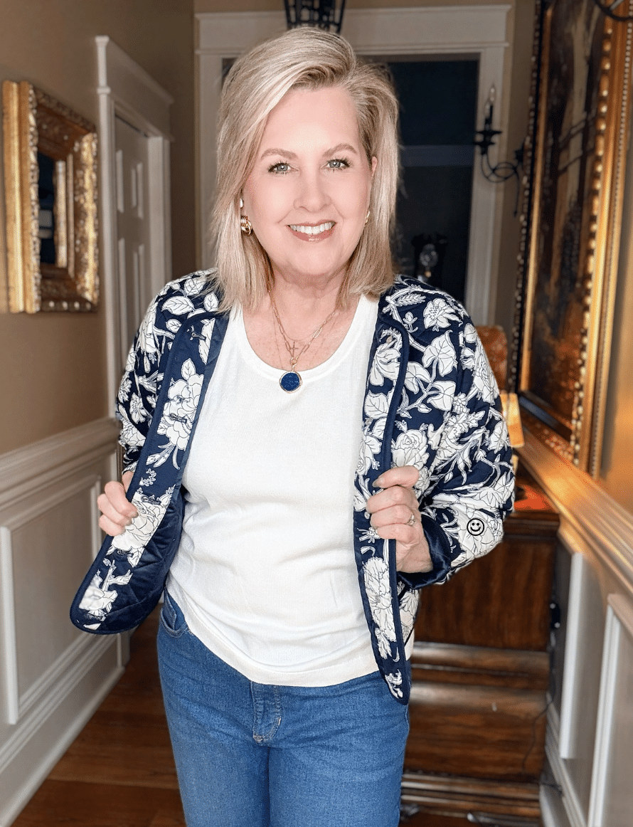 Tania wearing a blue & white floral jacket and a white top from Walmart